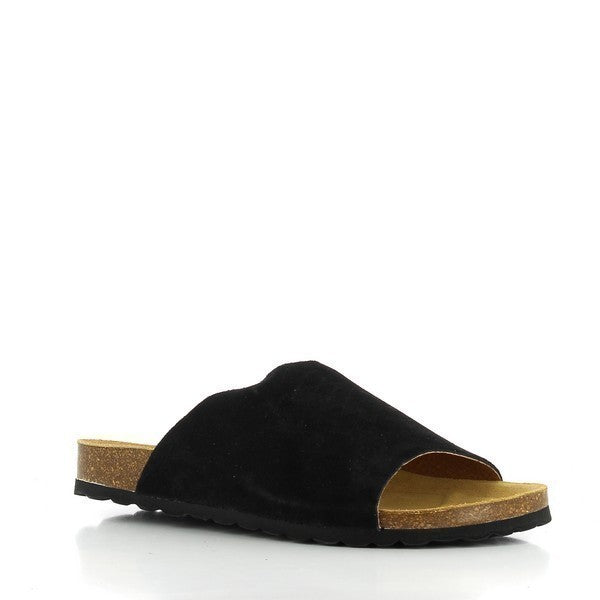 This angle captures the sleek profile of Plakton's 103036 Black Women's Slides. The smooth black leather upper shines elegantly under the light, while the rounded toe shape offers a classic and comfortable fit.