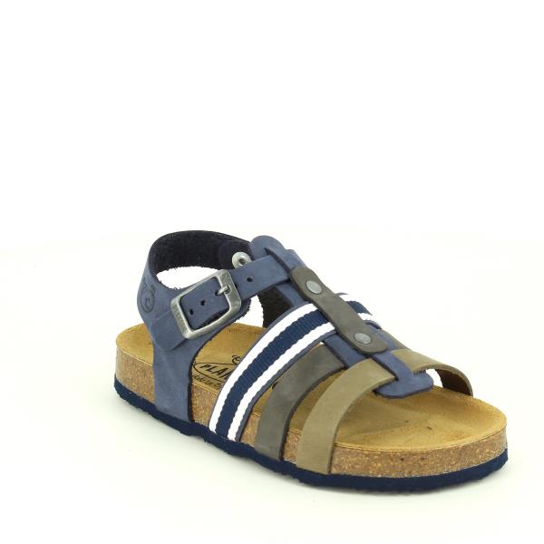 This image presents the sandal at an angle, highlighting the stylish navy leather, the multi-strap configuration, and the rounded toe shape. The Memory Cushion Technology sole is visible, emphasizing comfort and support.