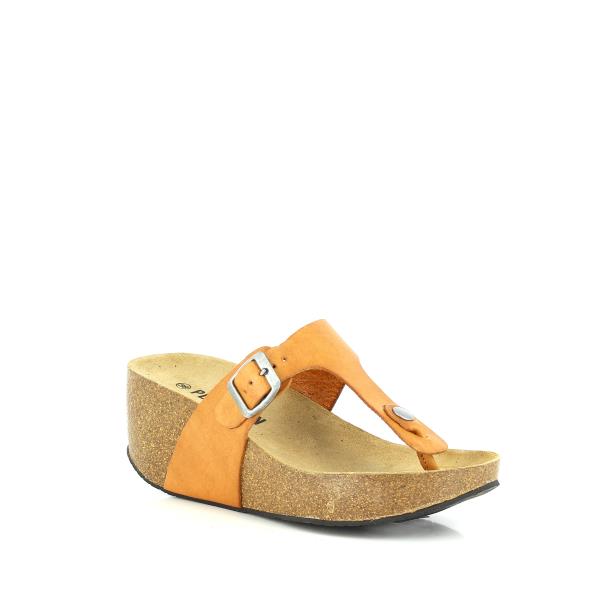 An angled shot highlighting the elegant design of the mustard thong wedge sandal. This perspective emphasizes the sleek lines and the combination of the leather upper with the cork and synthetic sole. The wedge heel provides a stylish lift while maintaining a comfortable platform.