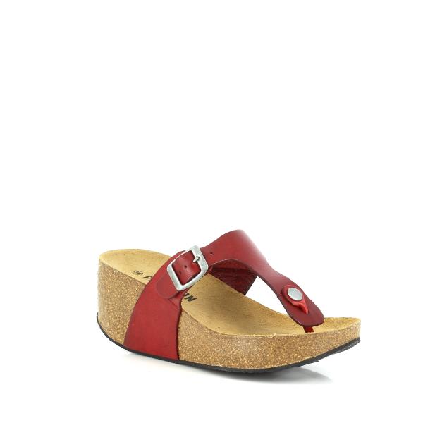 An angled shot showcasing the sophisticated design of the red thong wedge sandals. This perspective emphasizes the smooth lines of the leather upper and the blend with the cork and synthetic sole, showcasing its comfort and durability. The wedge heel offers a stylish lift while maintaining stability and support.