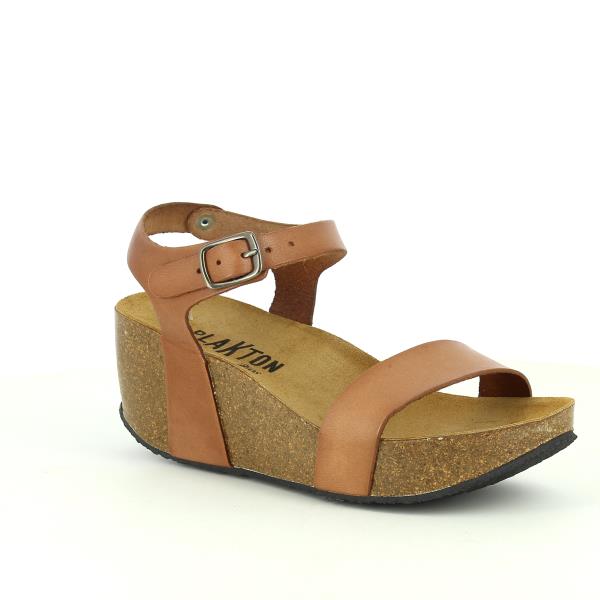 Highlight the elegant design of Plakton's 273023 Brown Wedges, emphasizing the round toe shape and adjustable buckle. Perfect for adding a touch of style to any outfit.