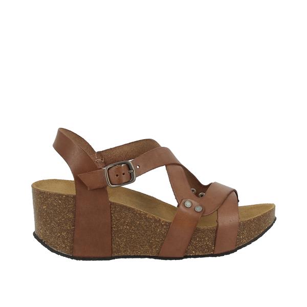 A side profile of Plakton's 275311 Brown Cross-Strap Slingback Wedges, highlighting the rich brown leather and elegant cross-strap detail.