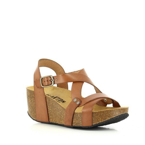 Plakton's 275311 Tan Cross-Strap Slingback Wedges captured from a stylish angle, highlighting the round toe shape and the sturdy cork sole