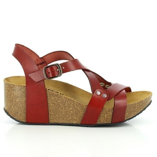 A striking pair of Plakton 275311 Red Cross-Strap Slingback Wedges for women, showcasing a rich red leather upper and lining. These wedges feature an eco-friendly cork sole with synthetic overlay for durability. The design includes a round toe, cross-strap detail, and slingback buckle, with a heel-platform height ranging from 1.5cm to 6.5cm. Expertly crafted in Spain for superior quality and style.