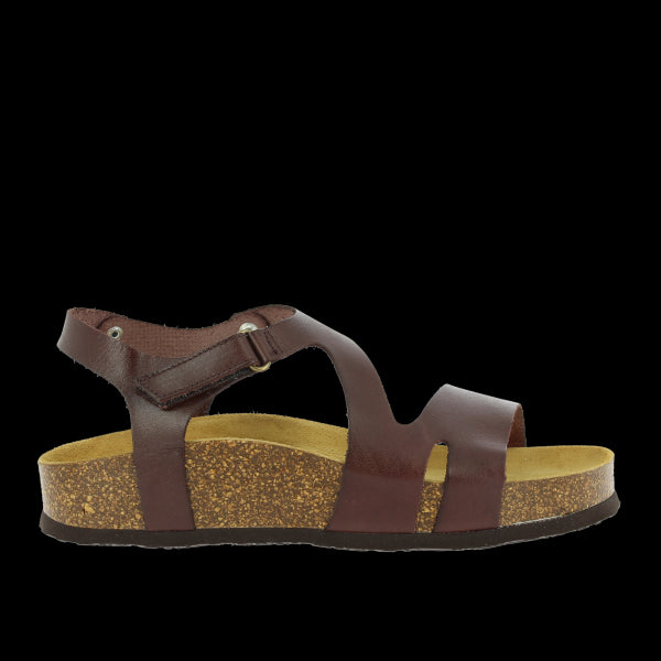 A side view of Plakton's 345647 Brown Slingback Sandals showcases their sleek profile and premium leather construction. The adjustable hook-and-loop fastener provides a customizable fit, while the cork sole ensures comfort and support.