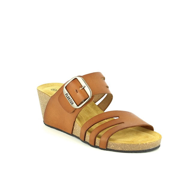 From an angled perspective, highlight the chic design of the wedges, featuring the stylish buckle on the upper strap and the detailed craftsmanship. This view captures the blend of fashion and function, showcasing the comfort and elegance of the slide wedge style.
