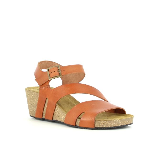 From an angled perspective, highlight the chic design of the wedges, featuring the stylish slingback strap and the detailed craftsmanship. This view captures the blend of fashion and function, showcasing the comfort and elegance of the wedge style.
