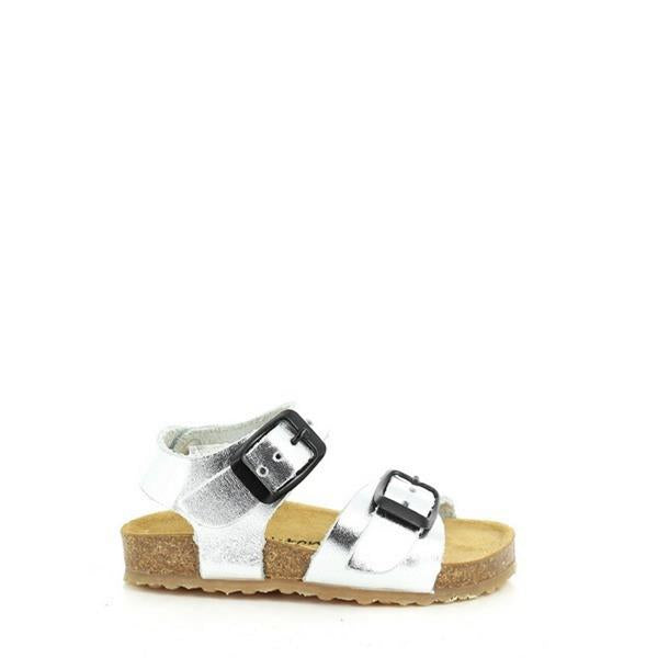 Side view of Plakton's 851407 Silver Kids Slingback Sandals showcasing the sleek silver leather upper, adjustable black buckle strap, and 1.5 cm cork platform for stability and style.