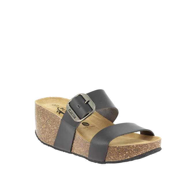 The angled view captures the Plakton 873004 Dark Grey Wedges from a dynamic perspective, emphasizing the curvature of the cork wedge heel and the stylish round toe. The rich dark grey leather and the minimalist design of the straps are clearly visible.