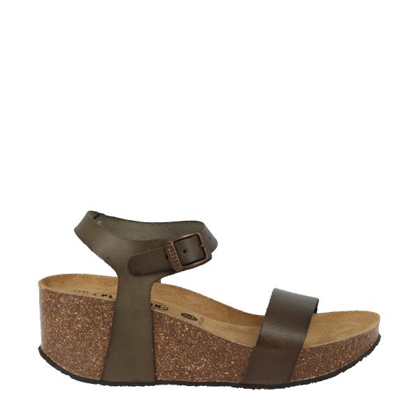 The photo shows the Plakton 873015 Musk Slingback Wedges from the side, highlighting the sleek, rounded toe and elegant design. The 7cm cork wedge heel provides both height and stability, while the premium leather upper and lining add a touch of sophistication. The adjustable slingback strap is visible, offering a customizable fit.