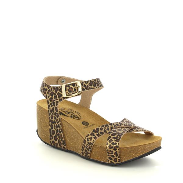 An angled shot of the Plakton 875087 Leopard Print Wedge highlights the elegant curve of the shoe, the adjustable slingback strap, and the contrast between the leopard print upper and the cork sole.