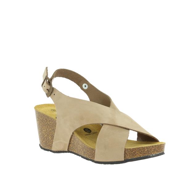 A dynamic angle view of the Plakton 885902 Taupe Cross-Strap Slingback Wedges, emphasizing the depth and curve of the 7 cm wedge heel. The photo captures the interplay between the taupe leather straps and the eco-friendly cork sole, offering a glimpse of both style and functionality.