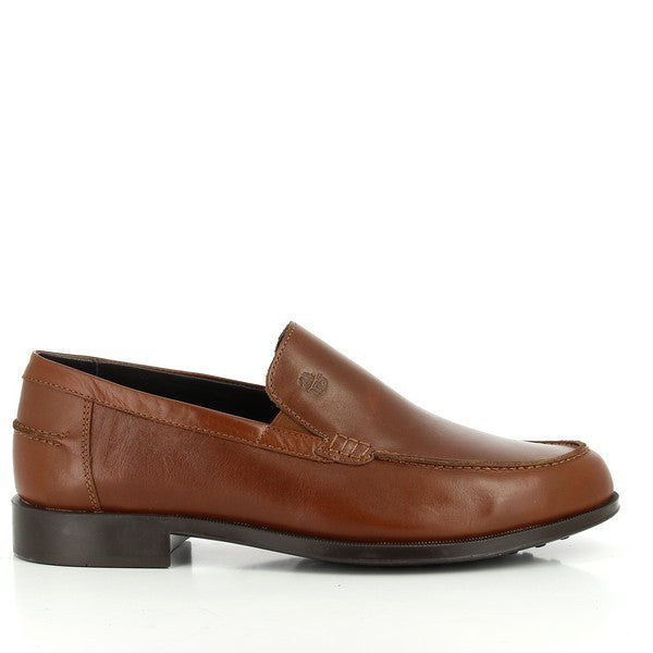 This image showcases the 24 Hrs 10015 Tan Men's Loafers from the side, highlighting their sleek design and premium leather upper. The rounded toe shape and minimalist profile create a classic, sophisticated look.