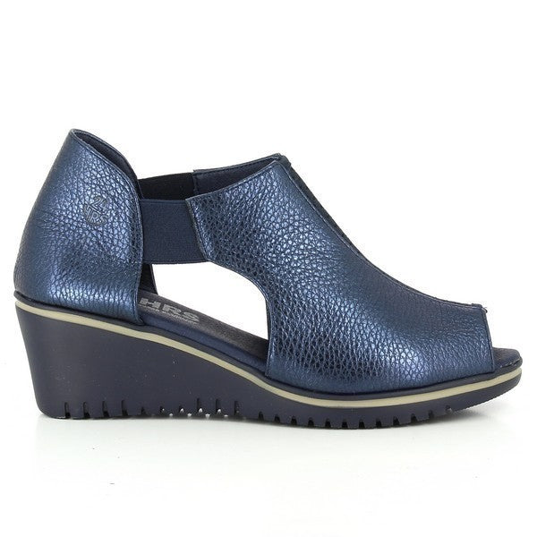 A pair of 24 Hrs 23243 Navy Wedge Sandals for women is showcased on a clean, neutral background. The sandals feature a deep navy leather upper with a sleek finish and elastic sides for a comfortable, flexible fit. The 5.5 cm wedge heel adds a stylish lift, while the soft leather lining and durable synthetic sole provide all-day comfort and support. The design highlights the meticulous craftsmanship and elegant style made in Spain.