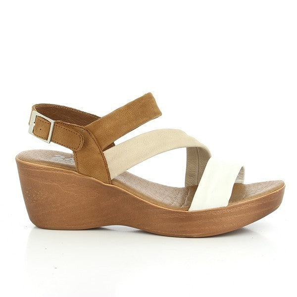 The 24 Hrs 23303 Tan Slingback Sandals are elegantly showcased against a neutral background. The sandals feature a sleek tan leather upper with a stylish slingback design and an adjustable buckle for a secure fit. The 6 cm heel-platform provides a chic lift, while the classic round toe ensures timeless style. The high-quality leather lining and durable synthetic sole highlight the expert craftsmanship of these Spanish-made sandals, perfect for adding a touch of sophistication to any outfit.