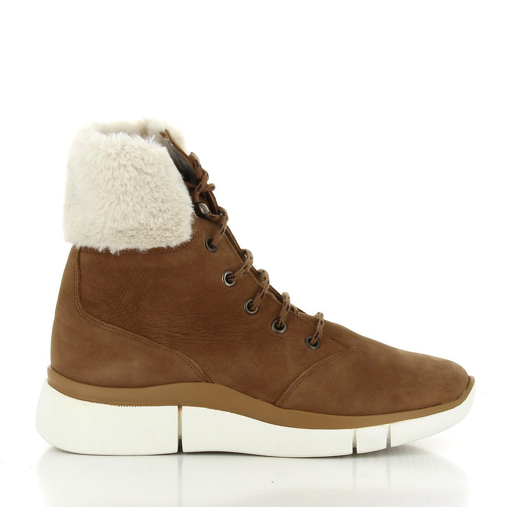 A pair of 24HRS 24305 Tan Lace-Up Ankle Boots, showcasing their premium leather upper with a rich tan finish. The boots feature sturdy laces, a cozy fur lining visible at the top, and a durable synthetic sole with a subtle 2cm heel. The round toe shape and handcrafted details highlight the quality and comfort of these stylish women's shoes.