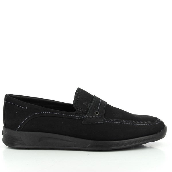 A close-up of the 9988 Black Loafers showcasing their sleek black leather upper. The photo highlights the classic loafer design with its rounded toe and minimalistic silhouette. The leather texture is prominent, emphasizing the craftsmanship. The synthetic sole is visible from the side, complementing the sophisticated design.
