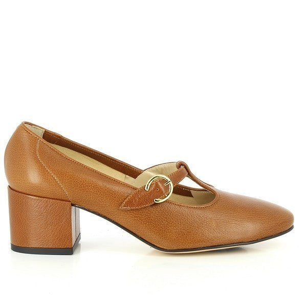 The photo shows the Amalfi Ticense Tan Pumps from the side, highlighting the smooth tan leather upper and the elegant profile of the shoe. The clean lines and classic shape are emphasized, showcasing the timeless design.