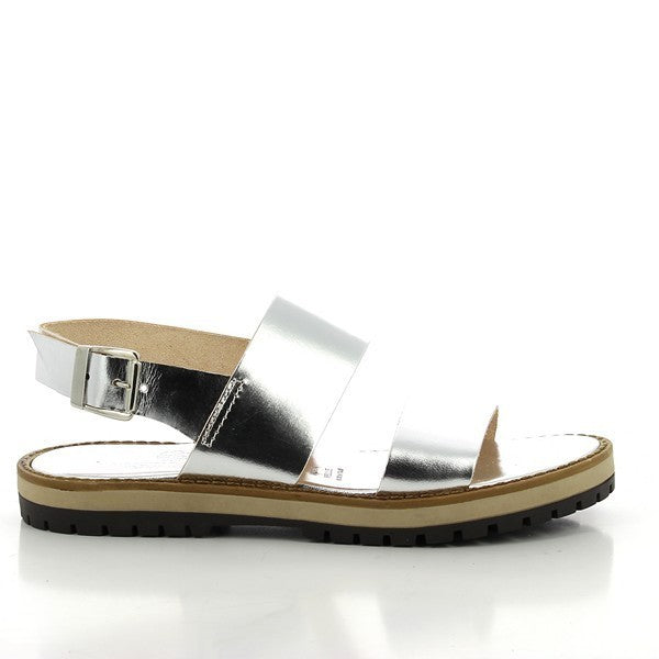The Antichi Romani 899 Silver Slingback Sandals are elegantly displayed, showcasing their radiant silver leather upper that glistens in the light. The round toe design provides a classic silhouette, while the adjustable slingback strap adds both style and functionality. The sandals feature a 2cm heel-platform, creating a subtle lift that enhances comfort and elegance. The interior is lined with soft leather, ensuring a cozy fit, while the durable synthetic sole promises longevity and flexibility. 