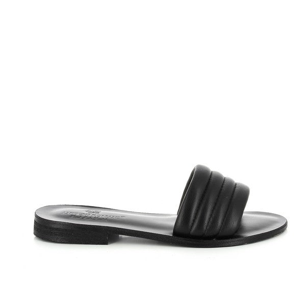 The Antichi Romani 901 Nero Black Slides are elegantly presented, showcasing their sleek design and luxurious materials. The premium black leather upper has a smooth finish, exuding sophistication, while the soft leather lining ensures a comfortable fit. The slides feature a classic round toe shape, making them versatile for any outfit. The sturdy synthetic sole provides durability and traction, perfect for both indoor and outdoor wear. 