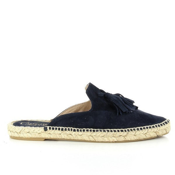 The image shows the Calzanor 9409PO Navy Slide Espadrilles in a classic navy blue shade, perfect for versatile styling. The espadrilles feature a soft leather upper and lining, providing a comfortable fit and adding a touch of elegance. The natural jute sole is visible, highlighting the eco-friendly materials and craftsmanship involved in their creation. A lightweight synthetic sole with a 1 cm platform heel offers gentle lift and support, making these shoes ideal for casual wear. 