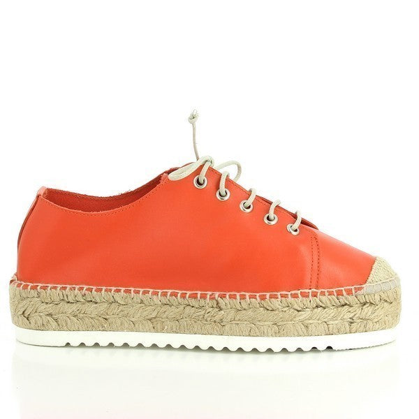 A close-up side view of the Calzanor M9551BPO Red Lace-Up Espadrilles, showcasing their sleek red leather upper, rounded toe, and sturdy 3cm synthetic wedge sole.