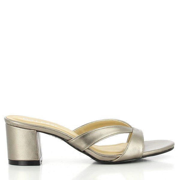 The photo features Dalessi Daily Pewter Slides, showcasing their sleek synthetic pewter upper with a subtle metallic finish. The round toe shape offers a comfortable fit, while the leather lining ensures a soft, breathable feel. A 6 cm heel adds a stylish lift, perfect for both casual and dressy occasions. The synthetic sole provides durability and traction, making these slides practical for everyday wear.