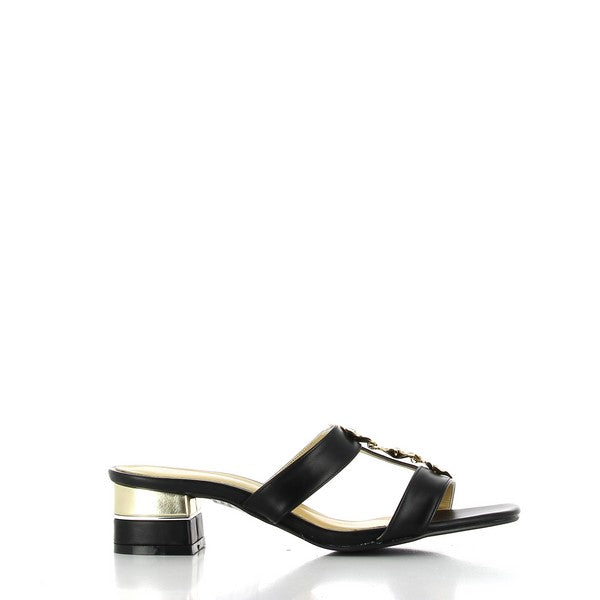 The photo features Dalessi Daisy Black & Gold Slides, highlighting the elegant leather upper with a chic black and gold combination. The round toe shape ensures comfort, while the leather lining provides a soft, breathable interior. A 5 cm heel adds a flattering lift, perfect for both casual and semi-formal occasions. The synthetic sole offers durability and reliable traction, making these slides practical and stylish for everyday wear. 