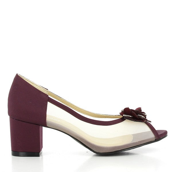 The side of the Dalessi Dalliance Purple Heels, showcasing the vibrant purple synthetic upper and the transparent front panel. The elegant 5.5 cm heel adds a sleek touch, while the round toe offers a timeless silhouette.