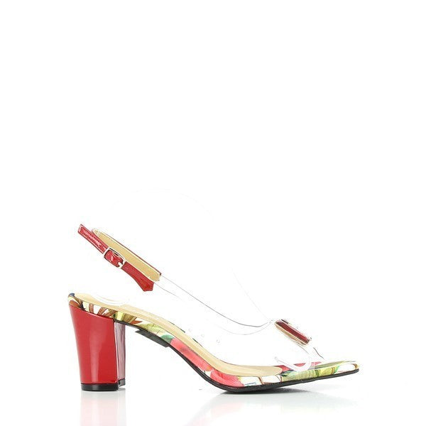 A side view of the Dalessi Dazzle Red Slingback Heel, highlighting the transparent upper, vibrant red leather slingback strap, and elegant 7.5cm heel, with the stylish red jeweled buckle adorning the front.