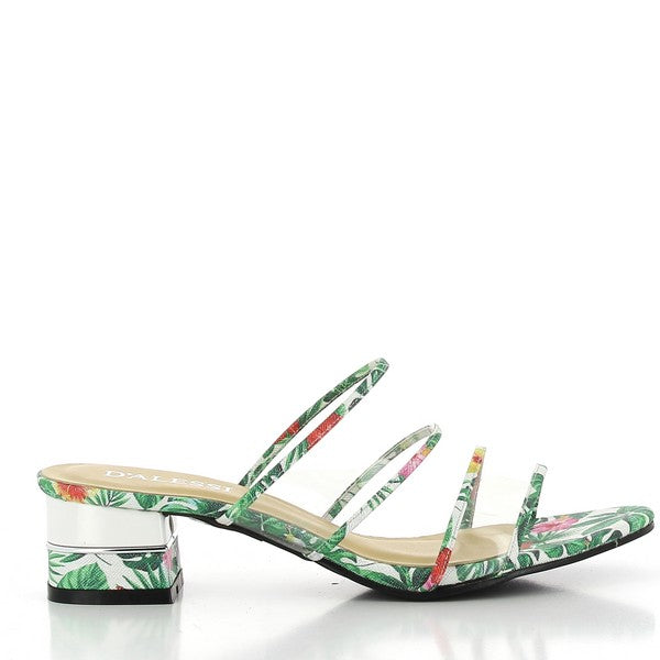 A side view of the Dalessi Decor Green Slides captures the vibrant green tone, four thin straps with tropical motifs, and the transparent 4 cm heel for an elegant touch.

