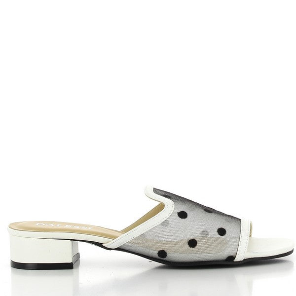 The Dalessi Dotti White Slide showcases its sleek and minimalist side profile, highlighting the clean, smooth synthetic upper and subtle round toe. The mesh detailing with playful dots creates a fresh, breathable look, while the 3cm heel-platform adds a slight lift for a comfortable step.