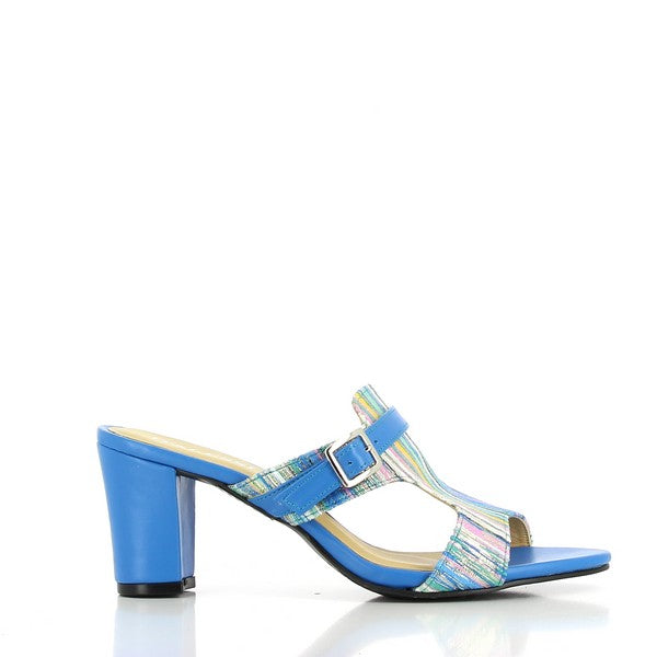 This side view of the Dalessi Pinta Royal Blue Slides highlights the vibrant multi-color leather upper with its bold design. The sleek, rounded toe shape offers a sophisticated look, and the 7.5 cm heel-platform height gives the shoe an elegant lift, making it both stylish and comfortable.