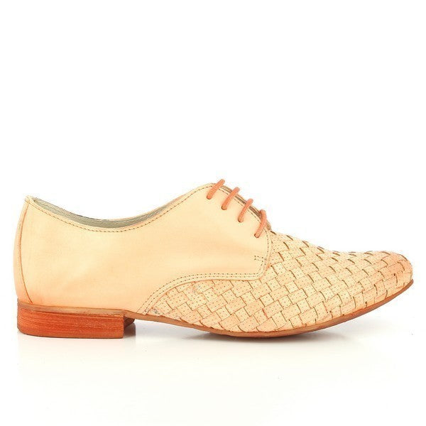 A close-up shot showcasing the elegant side view of the Felmini 1169 Apricot Lace Up Derby Shoes. The smooth leather upper is paired with a woven toe cap, offering a timeless and sophisticated look. The lace-up design provides a perfect fit, with a sleek, minimalistic silhouette that highlights its versatility.