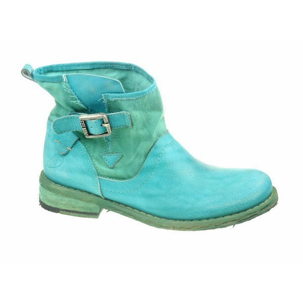 The side of the Felmini 8264 Aqua Ankle Boots shows the sleek aqua blue leather upper with a clean, minimal design. The decorative strap and buckle are visible, adding a chic touch to the silhouette. The round toe and smooth lines highlight the boot’s elegant and contemporary style.