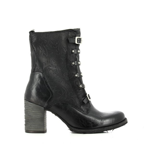 A side view of the Felmini B329 Black Lace-Up Boot showcasing its sleek black leather upper with subtle floral motifs etched into the surface. The silver buckle strap detail runs across the ankle, adding a refined touch, while the 7.5cm heel-platform offers a balanced elevation.