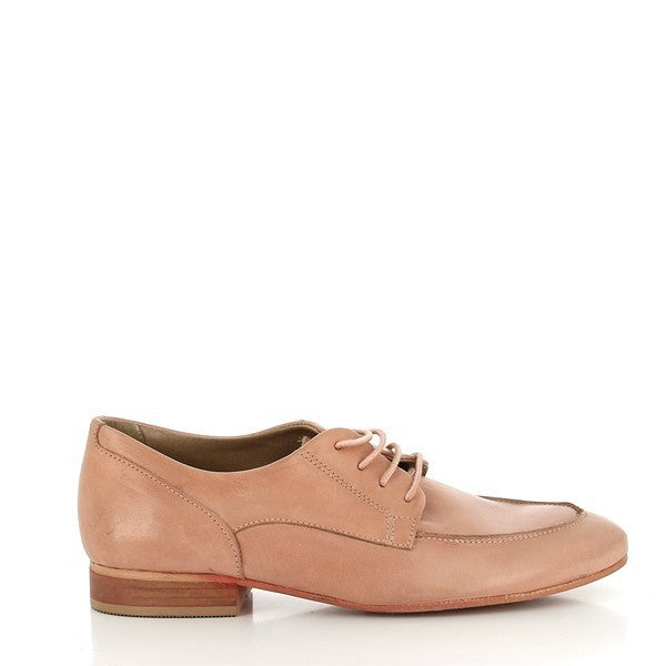 A side view of the Felmini B749 Pale Pink Lace-Up Shoe showcasing its sleek silhouette, pale pink leather upper, round toe, and low 2cm platform heel.