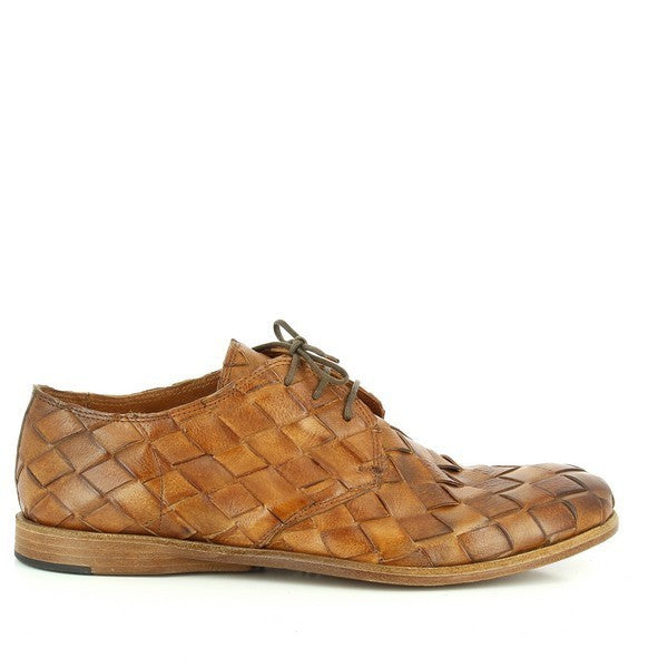 A profile view of the Forte 4056 Brown Lace-Up Men's Shoes, showcasing the intricate braided leather upper and sleek round-toe design. The rich brown color highlights the artisanal hand-painted finish, while the sturdy leather sole adds a touch of sophistication.