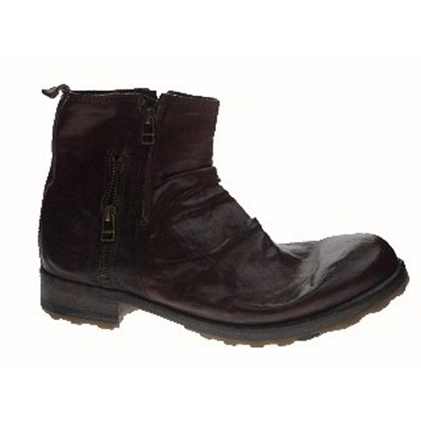 The side view of the Forte 5200 Brown Ankle Boots showcases their sleek leather exterior with a round toe and clean lines, offering a sophisticated, minimalist look.

