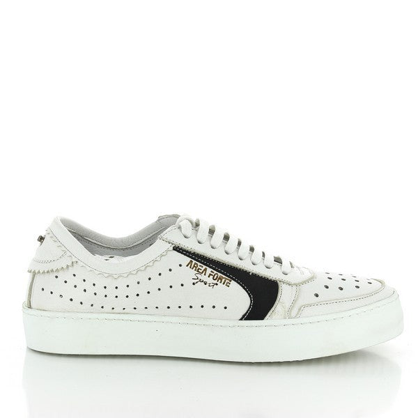 A clean, minimal profile showcasing the white leather upper, accentuated by a sleek black line running along the sole. Perforated detailing adds texture and breathability, while the round toe shape ensures a timeless look.