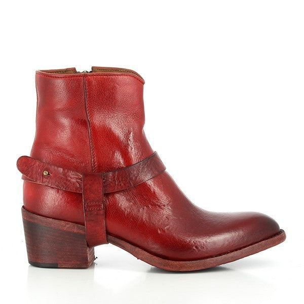 A striking side profile of the red ankle boot, showcasing the smooth leather upper, inner zipper closure, and the 5.5cm platform heel.