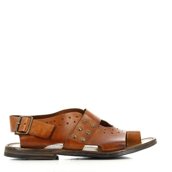 A clear side view of the Forte S182208 Tan Slingback Sandals, showcasing the wide leather strap with clean stitching and the rounded toe design. The tan color of the leather exudes a natural, elegant finish, complemented by the gold buckle on the slingback strap.

