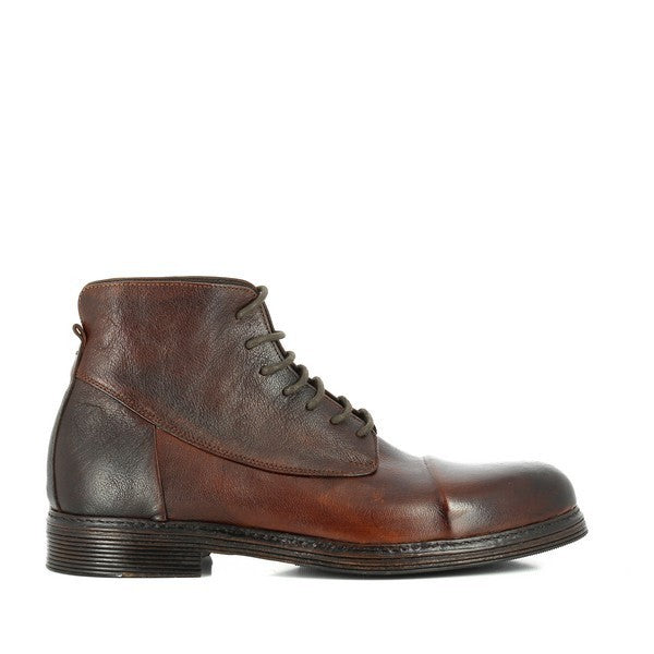 A detailed view of the Forte W163188 Brown Lace-Up Boots showcasing the premium leather upper with subtle texture, elegant stitching, and a rounded toe. The clean lace-up design and sturdy sole are prominent, highlighting the refined yet rugged aesthetic.