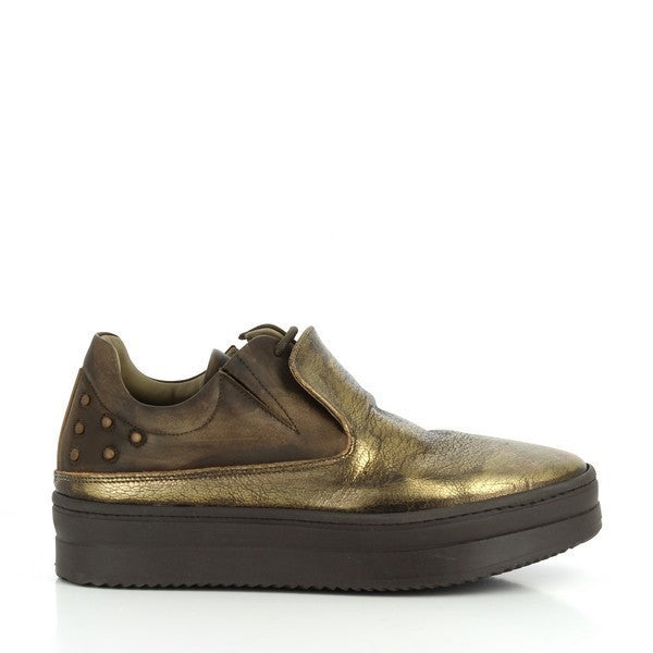 The sleek profile of the Forte W167034 Gold Sneakers showcases the smooth, metallic leather upper and clean lines, offering a refined and modern look.