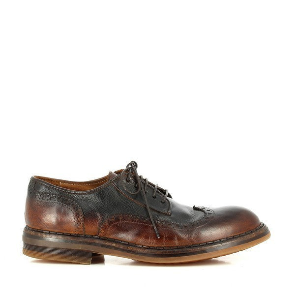 A close-up view of the Forte W172050 Capo Tan Lace-Up Shoes from the side, showcasing the smooth, polished leather upper with brogue detailing along the edges. The classic lace-up design is evident, offering a sleek, refined appearance.