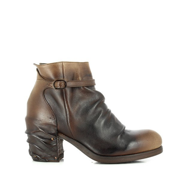 A clean, straight-on view of the Forte W186800 Taupe Ankle Boot, showcasing the textured, wrinkled leather upper and round toe. The decorative strap with a small buckle on the side adds a touch of elegance, while the sleek silhouette highlights its timeless design.