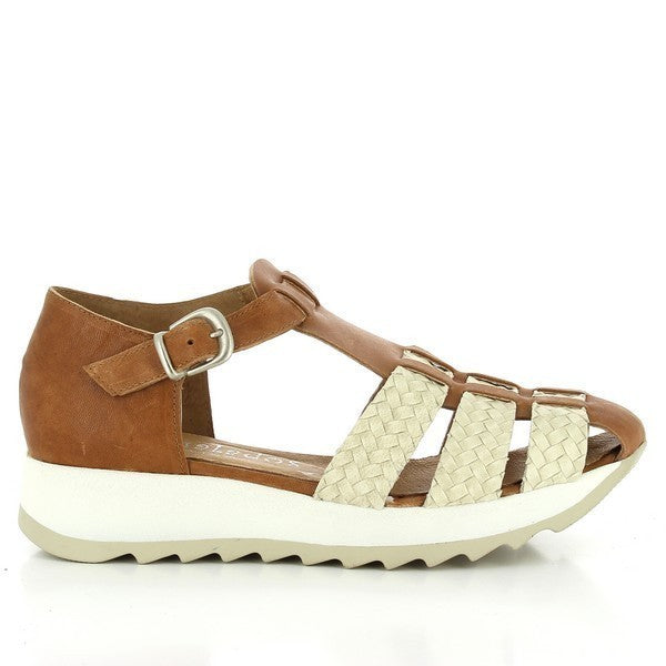 A stylish brown and white cage sandal with a premium leather upper, featuring an open design for breathability and an adjustable ankle strap with a buckle.