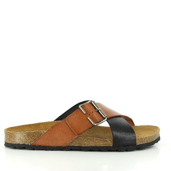 In the image, Plakton's 105011 Black & Brown Cross-strap Sandals command attention with their stylish design. The black and brown leather straps intersect elegantly, adorned with a golden buckle for a touch of refinement. Crafted with a 2.5cm platform heel and a comfortable cork and synthetic sole, these sandals offer both fashion and function. Step into sophistication with Plakton's Sandals.