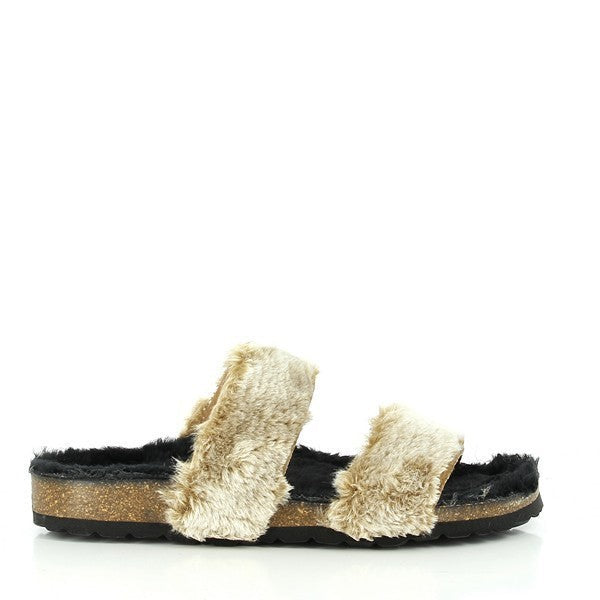 In the image, Plakton's 105051 Toffee Furry Sandals are showcased, featuring a cozy and stylish design. With two furry straps and a furry insole, these sandals offer ultimate comfort. Crafted with care in Spain, they boast a cork and synthetic sole, ensuring durability and stability. Step into luxury and comfort with Plakton's Sandals.