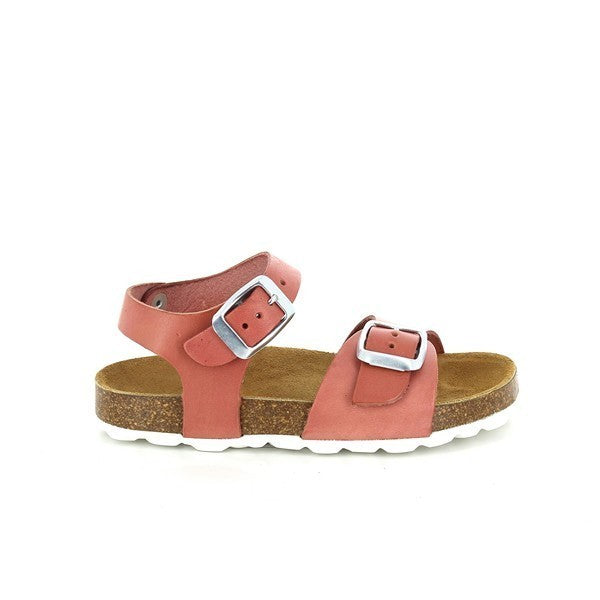 A delightful image showcasing the Plakton 110053 Pink Slingback Kids Sandals. The vibrant pink hue of the leather upper shines under the sunlight, accented by adjustable buckle straps and an ankle strap for a secure fit. The soft leather lining promises comfort while the round toe shape ensures ample space for little toes. With a cork footbed and a 2cm heel platform, these sandals offer both stability and style, perfect for your child's summer adventures.